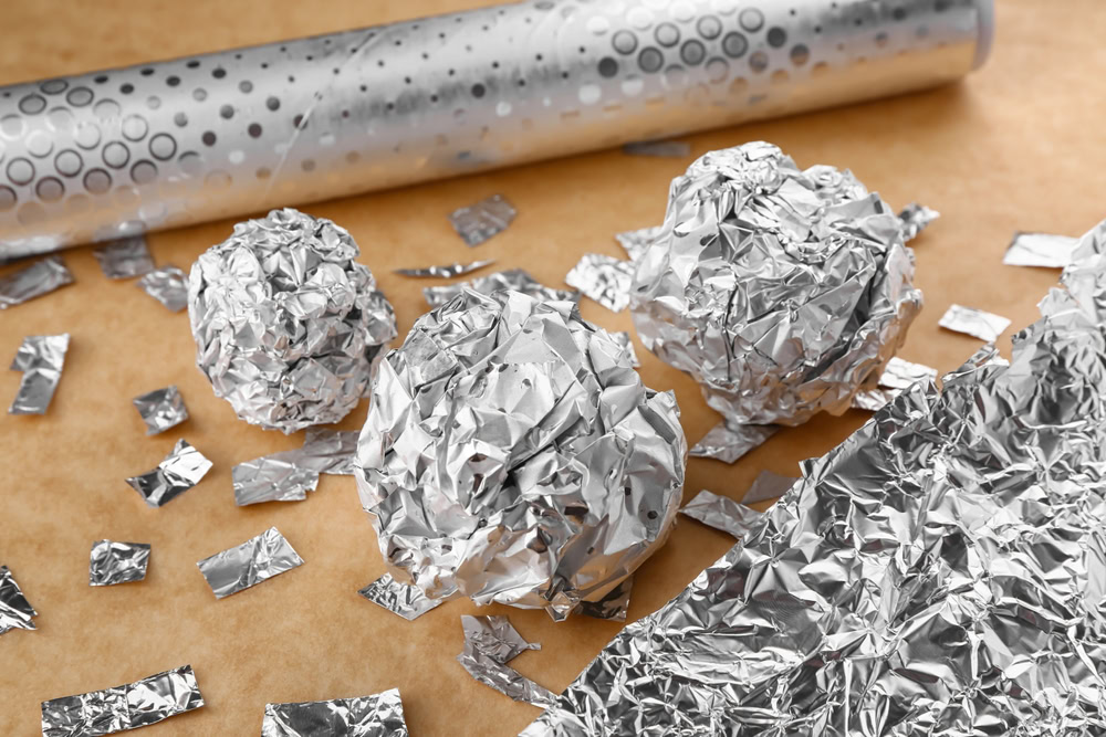 My Dog Ate Aluminum Foil: Our Vet Explains What To Do Next